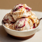 Peanut butter jelly ice cream in bowl