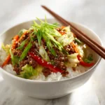 Asian cabbage ground beef stir fry served with rice in bowl