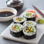 cucumber sushi roll recipe served with soy sauce ginger and wasabi